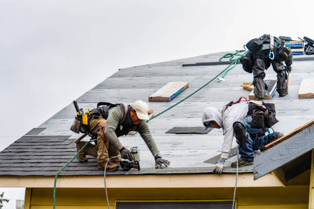 Professional Gutter Installation technician working in Hill City, KS